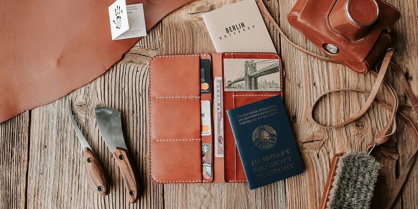 An image of handcrafted leather bags, belts, and wallets, displayed in a Turkish boutique.