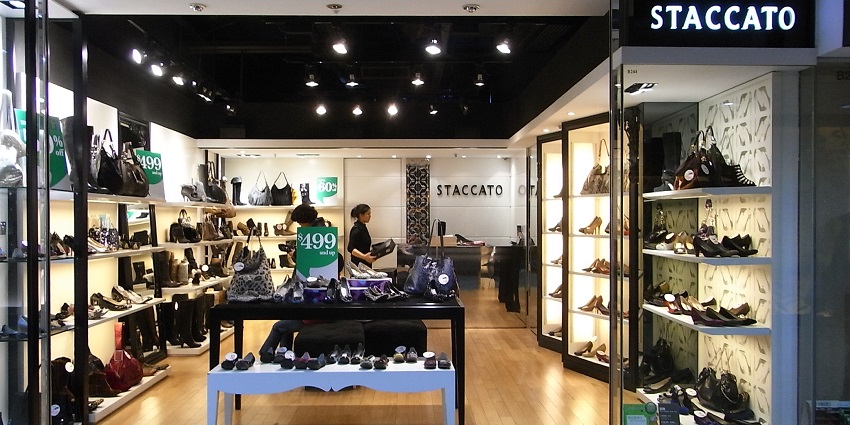 Handmade leather wallets and belts on display – durable top items to buy in Hong Kong.