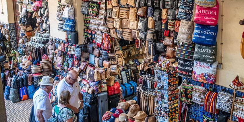 Leather goods stall on the ground floor with multiple leather goods in a variety of designs