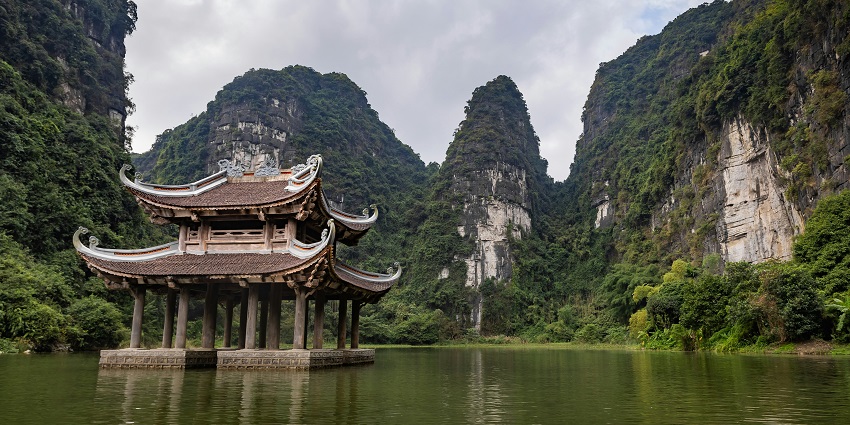 Trang An is in Ninh Binh Province, in Vietnam, which is about 99.5 km from Hanoi.