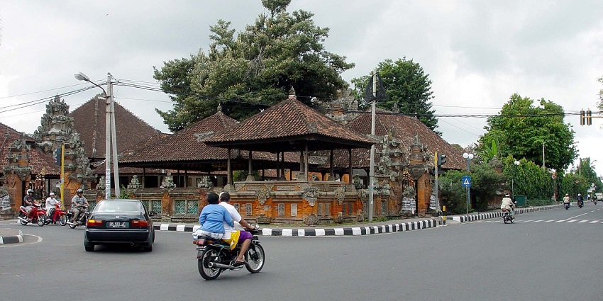 A bustling street in Gianyar, Bali, Indonesia showcasing the normal local life.