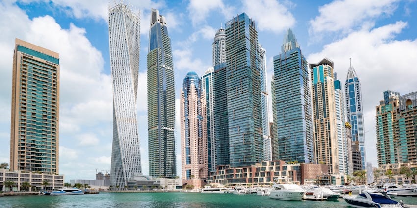Dubai in August showing city skyline and vibrant city life.