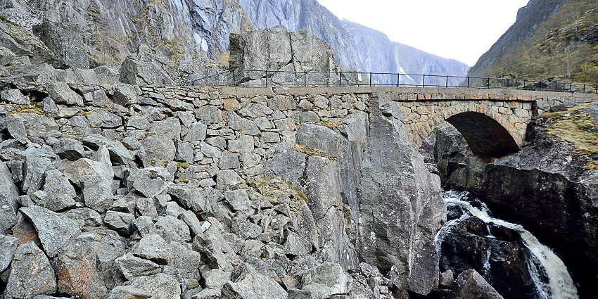 Image of a bridge built over the rocky cliffs in the Måbødalen Valley, one of the best Valleys in Norway.