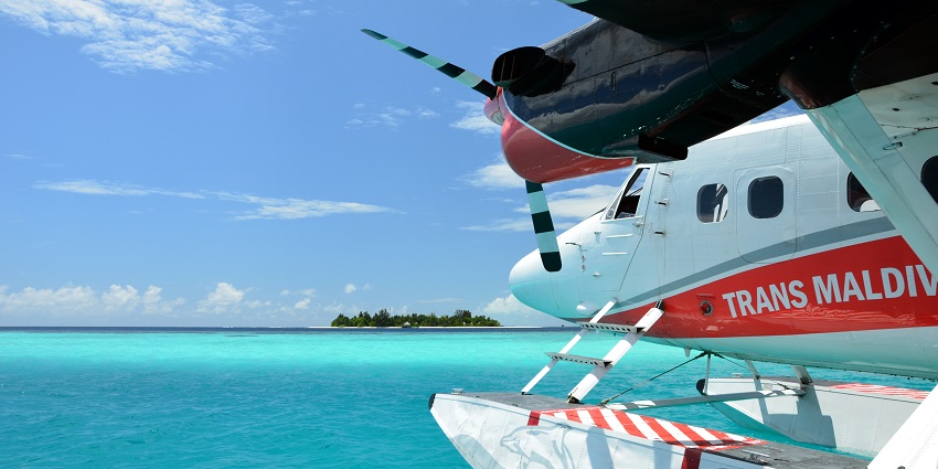 Escape to the Maldives for overwater bungalows and crystal waters near Mauritius.