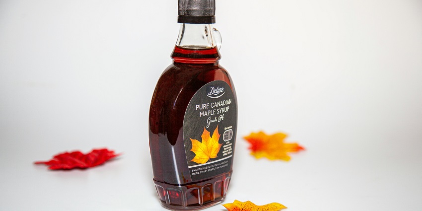 An image of maple syrup, one of the best things to buy in Canada for a true taste of the country.