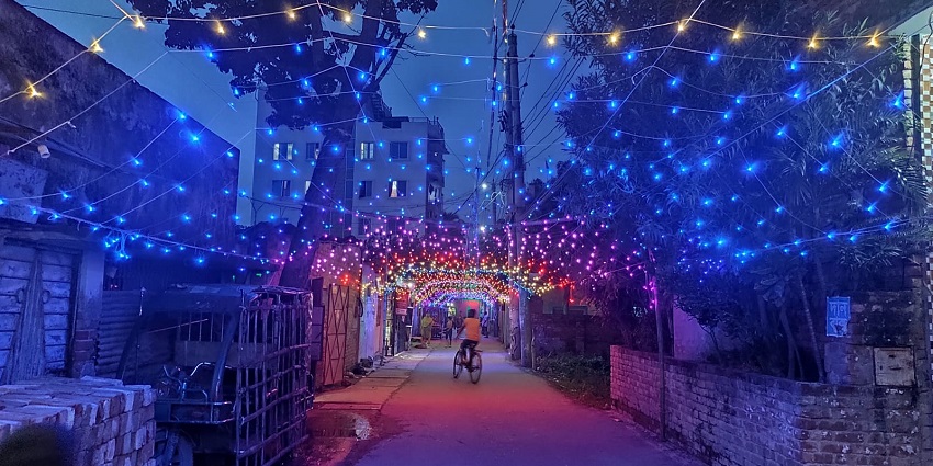 Street illuminated with colourful lights and decoration, during a festival in Bangladesh