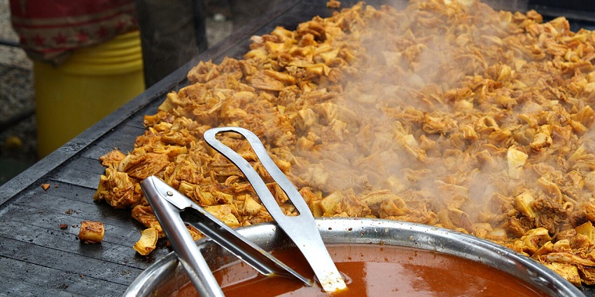 Visitors enjoy traditional Peruvian dishes like Rachi at Mistura, one of the festivals in Peru.