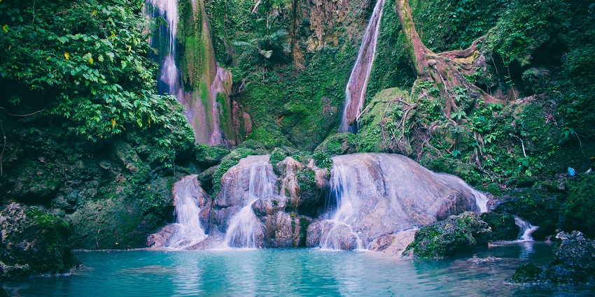 Mumbuluma Falls, a beautiful twin cascade among the scenic waterfalls in Zambia, set in a serene natural landscape.