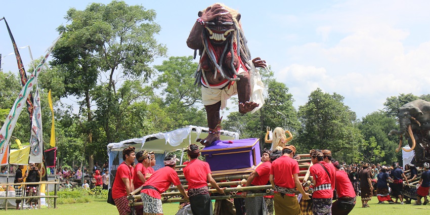 People performing the ogoh-ogoh dance one of the major festivals in Indonesia.