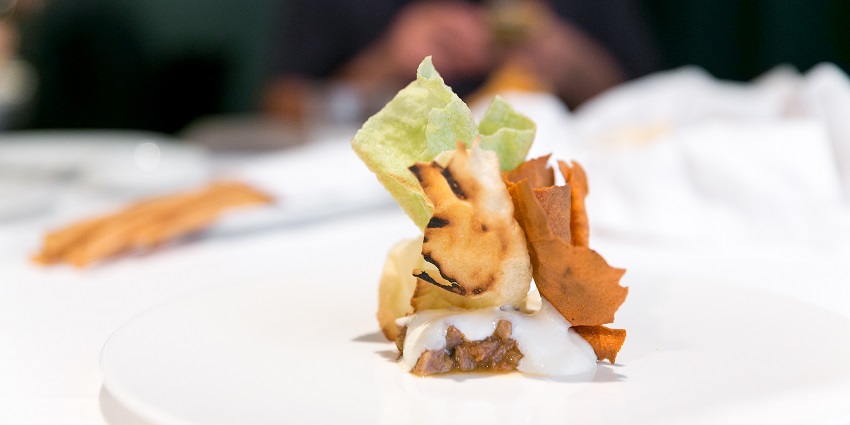Fine dining at Osteria Francescana, a Michelin-starred restaurant serving the finest food in Italy.