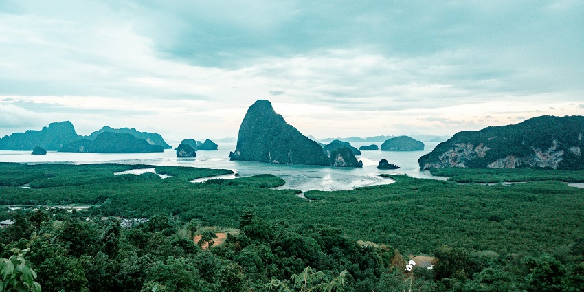 A scenic view of Phang Nga Bay, one of the idyllic places to visit in Phuket in June.