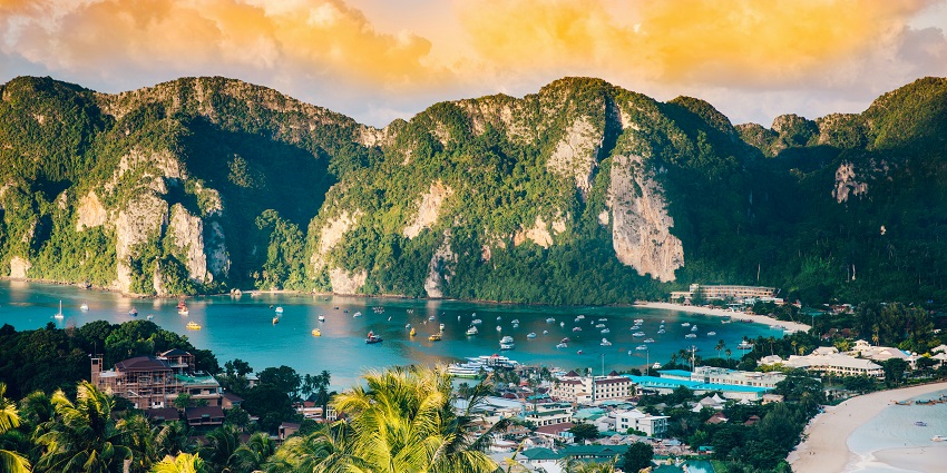 Iconic tropical islands with turquoise waters, limestone cliffs, and vibrant marine life.
