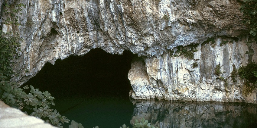 An image of Ju Pivka Cave, a beautiful limestone cave located in Slovenia, showcasing its stalactites and stalagmites.