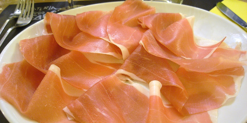 An image showing Pršut, an air-dried ham dish among Croatia's famous food.