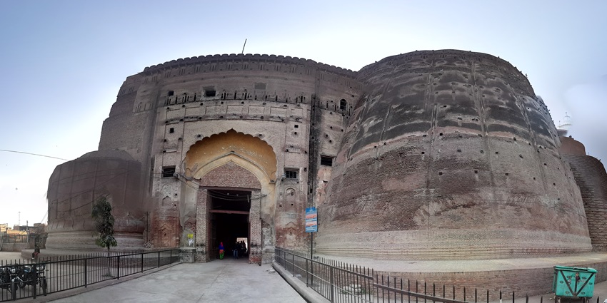 Historic arched gate of Qila Mubarak with detailed stone architecture–offbeat places to visit in patiala