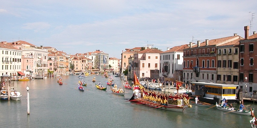 Colourful historical boats parade along the Grand Canal during Venice's Regatta Festival