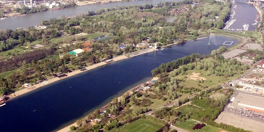 Escape to Ada Ciganlija, a popular island on the Sava River offering beaches, sports, and nature trails.