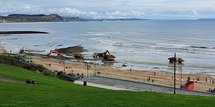 An image of people relaxing at the Abersoch Main Beach, among the best things to do in Abersoch.