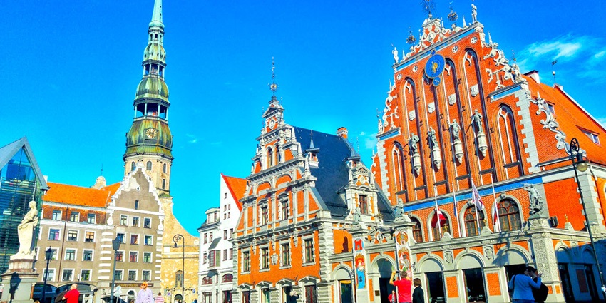Things to do in Riga include strolling through cobbled streets lined with mediaeval buildings, cafes, and historic landmarks in Vecrīga.