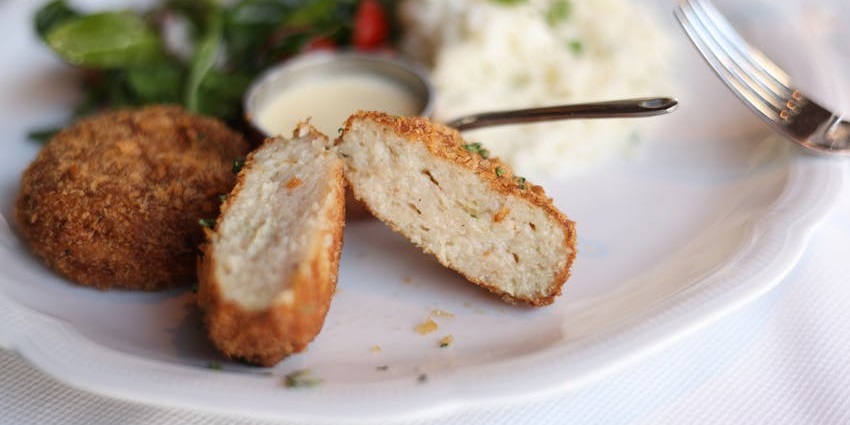 An image of Řízek, a famous breaded and fried meat cutlet to eat in the Czech Republic.