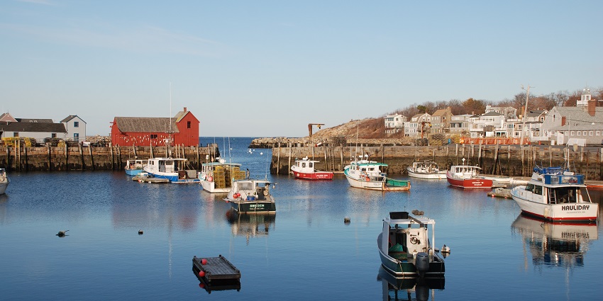 A picturesque coastal village with art galleries, fishing shacks, and rocky oceanfront views.