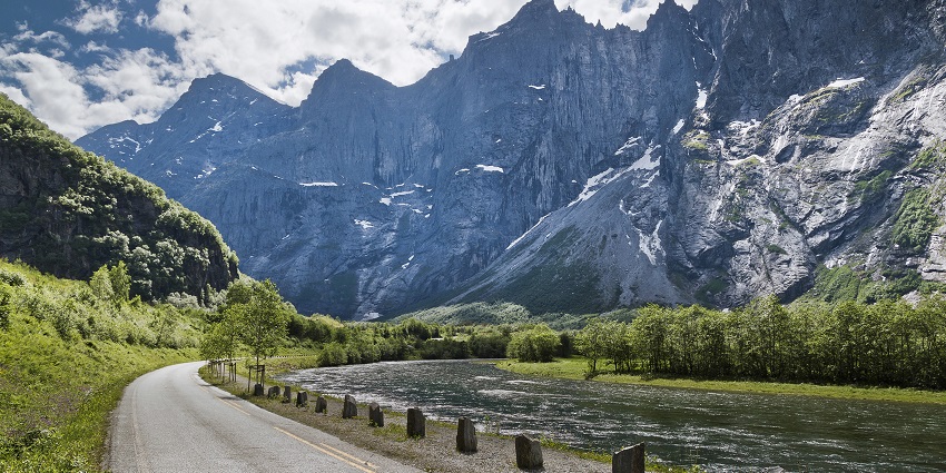 Image of the Romsdalen Valley in Norway showing the Trollveggen cliffs and the Rauma River