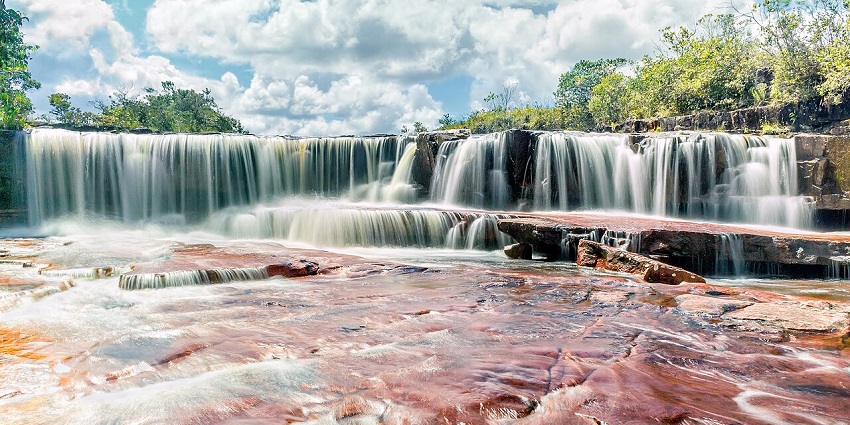 Milkish appearance due to multiple water streams of Salto Kawi near Gran Sabana Road.
