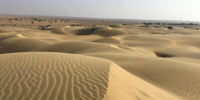 A breathtaking view of the golden dunes at Sam Sand Dunes, perfect for desert adventures.