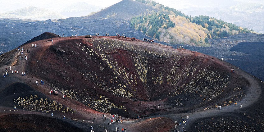 Hike or take a cable car to the summit of Mount Etna, Europe’s most active volcano, for breathtaking views, among the best things to do in Sicily, Italy.