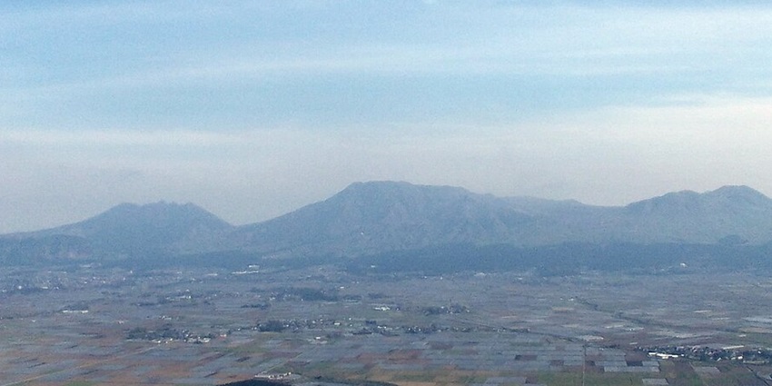 Wide view from Daikanbo over Aso caldera; visiting it is one of the great things to do in Aso.