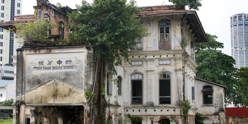 Walk past the Shih Chung Branch School in Penang, a colonial-era building surrounded by tales of hauntings.