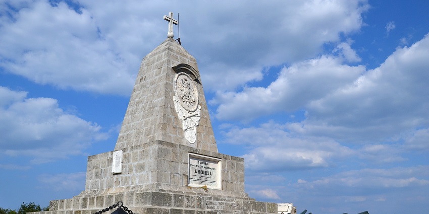 A hilltop monument honouring fallen Russian and Bulgarian soldiers with sweeping mountain views.