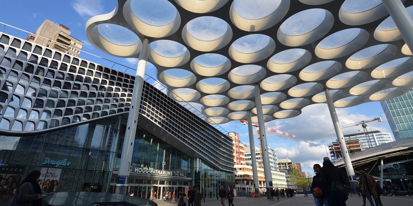 People entering the gates of Hoog Catharijne, an exquisite mall in Utrecht, Netherlands.