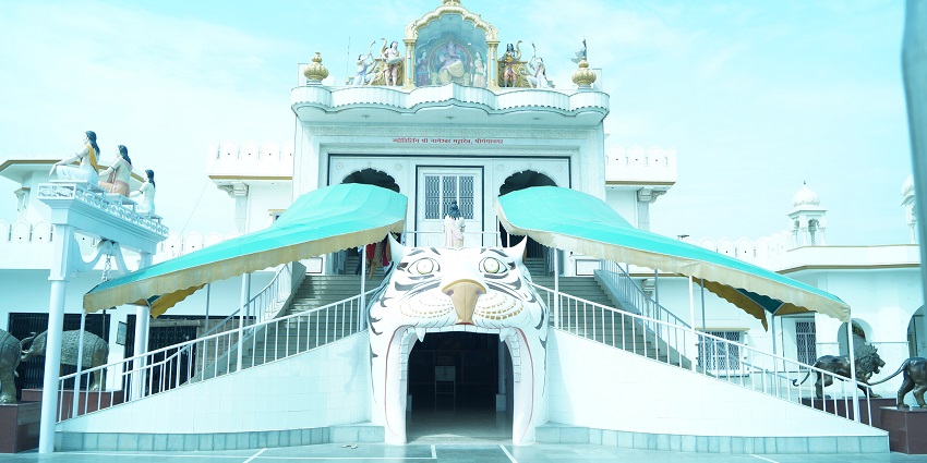 Shri Nageshwar Mahadev temple in Sri Ganganagar with high domes and carved white marble facade