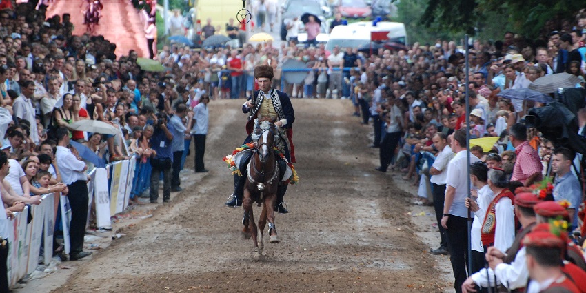 A costumed knight charges on horseback during Sinjska Alka, one of the festivals in Croatia.