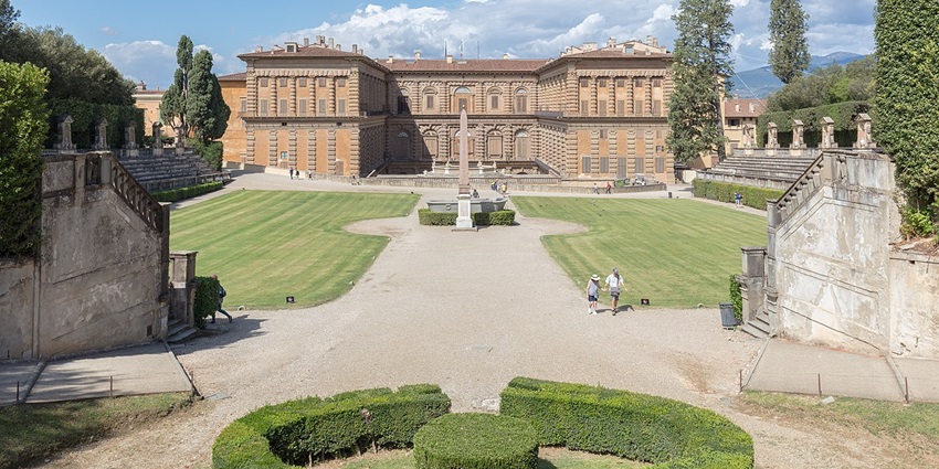  A family walking in the Boboli Gardens, one of the popular things to do in Florence in June.