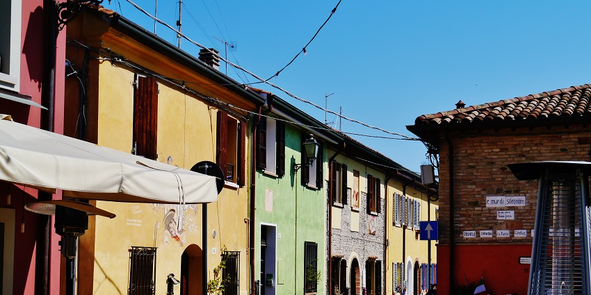 Discover street art and charm while strolling through the colorful Borgo San Giuliano.