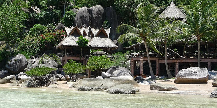 Enjoy a relaxing swim and refreshing cocktails at Sairee Beach, Koh Tao's lively seaside destination, among the best things to do in Koh Tao.