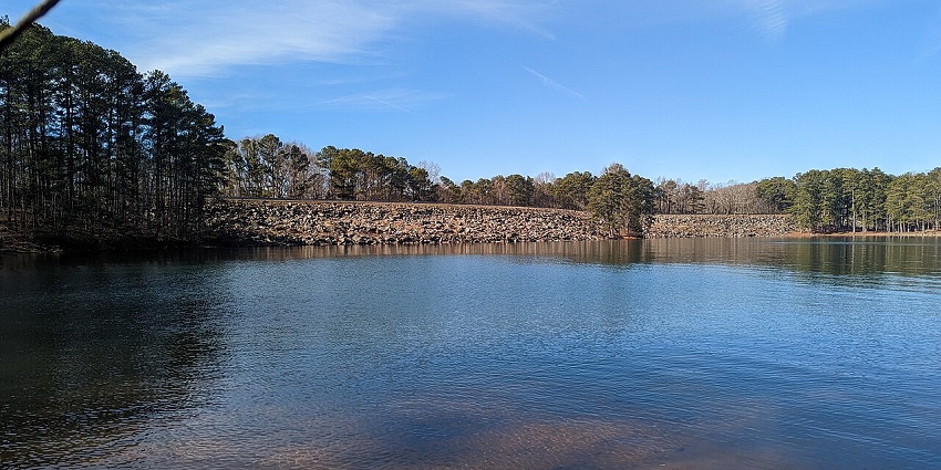 Shallow waters surrounded by greenery at Buford Dam Park, a top attraction in Buford.