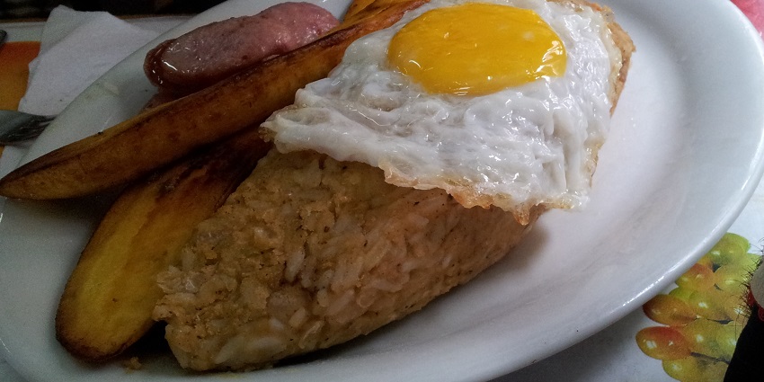 An image showing Tacu-Tacu, a famous dish made up of a mix of fried rice and beans.