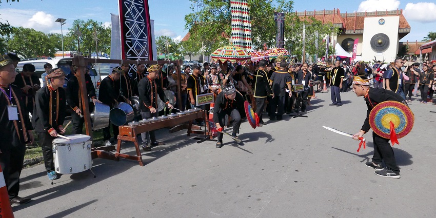 People in traditional attire perform cultural dances during the Tadau Ka’amatan Harvest Festival in Malaysia.