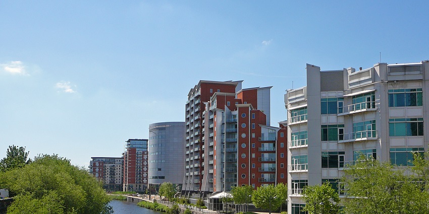 Stroll beside historic warehouses and canals on the scenic Leeds Waterfront, perfect for photography