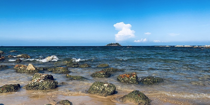 Visitors enjoying a swim in the tranquil, crystal-clear waters of Marble Beach, among the best things to do in Trincomalee.
