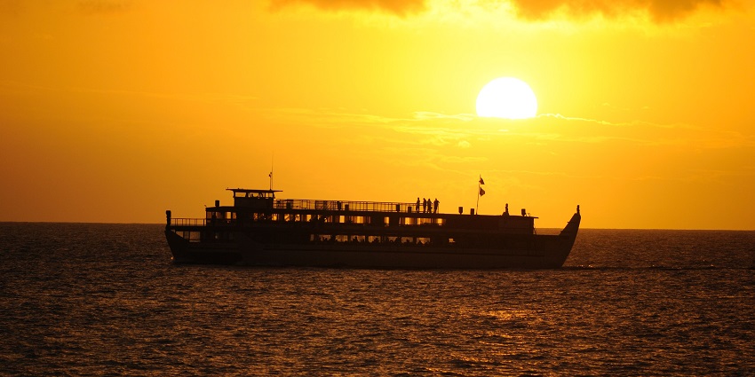 Relax on a cruise, one of the most romantic things to do in Praslin Island Seychelles.
