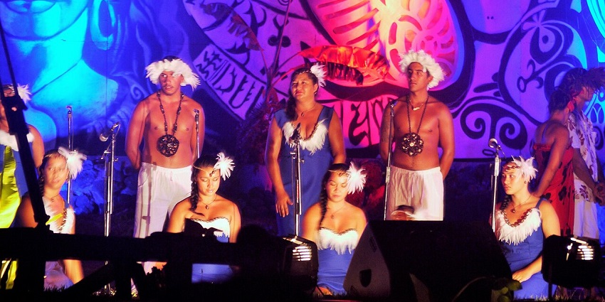 People in traditional attire perform music, dance, and sports during one of the festival in Chile.