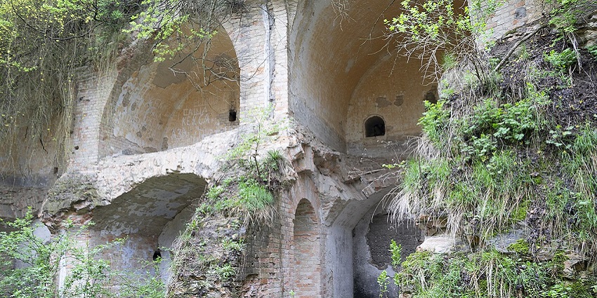 A semi-ruined military structure in Rivne Oblast, known for eerie echoes and paranormal accounts.
