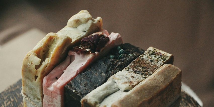 An image of handmade herbal soaps, part of the cheap things to buy in Thailand.