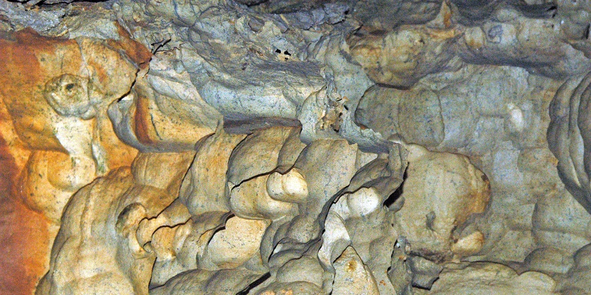 Glittering rock formations inside Tham Phra Nang Nai, or Diamond Cave in Thailand
