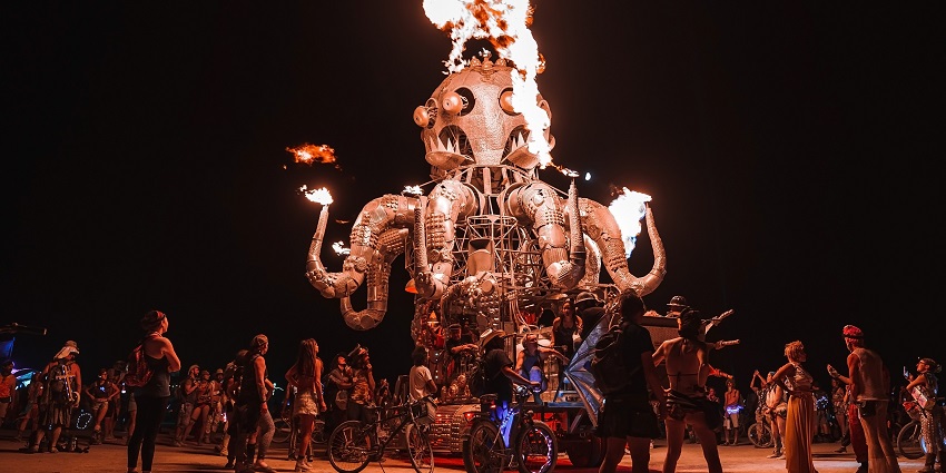 Performances by people laid out in the open desert of black rock city and people working on it