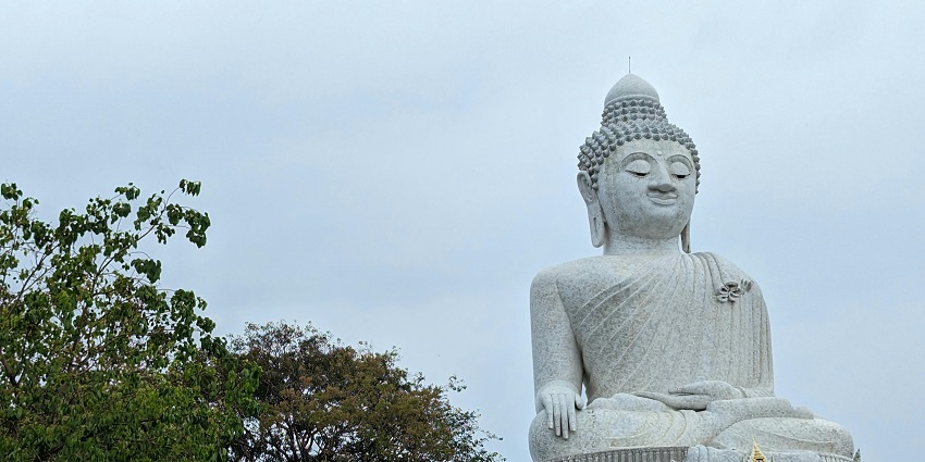 Close-up of the towering white marble Big Buddha statue on Nakkerd Hill in Phuket.